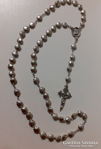 A rosary reader made of shell-shaped beads in good condition.