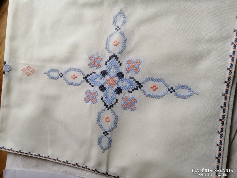 Hand-embroidered cross-stitch tablecloth