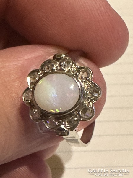 Very nice antique 14 kr gold ring decorated with beautiful opals and diamonds for sale! Price: 108,000.-