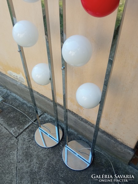 A pair of Bauhaus design, chrome-plated large glass globe floor lamps