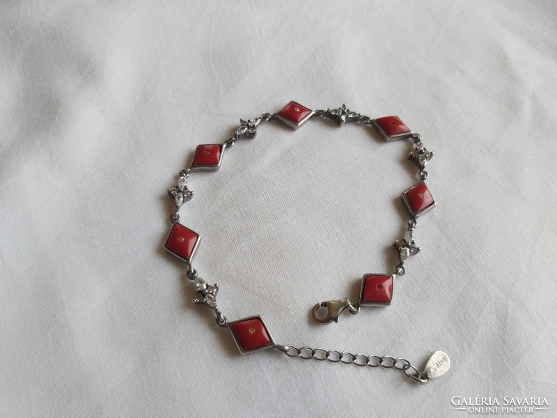 Silver bracelet with coral stones