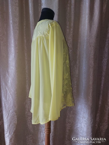 Bright lemon yellow, embroidered, longer back casual top