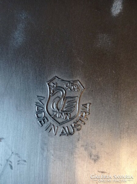 Pewter decorative wall plate with the title of the zither game