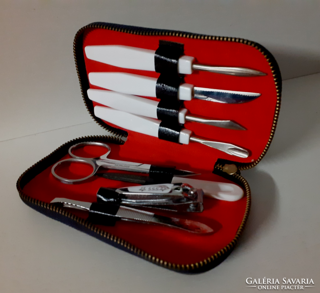 Old manicure set in beautiful condition in a black leather case