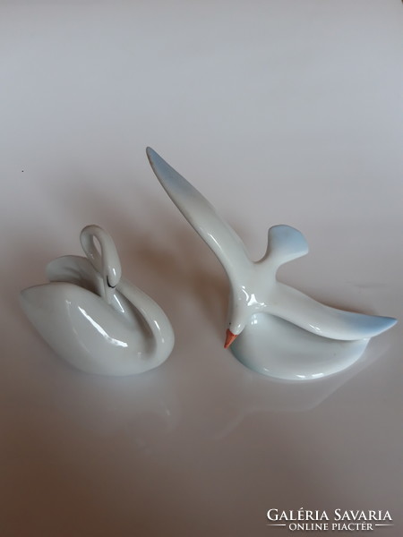 Two pieces of Raven House porcelain birds together