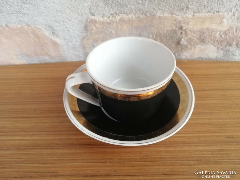 Black / gold Raven House mocha cup with small plate
