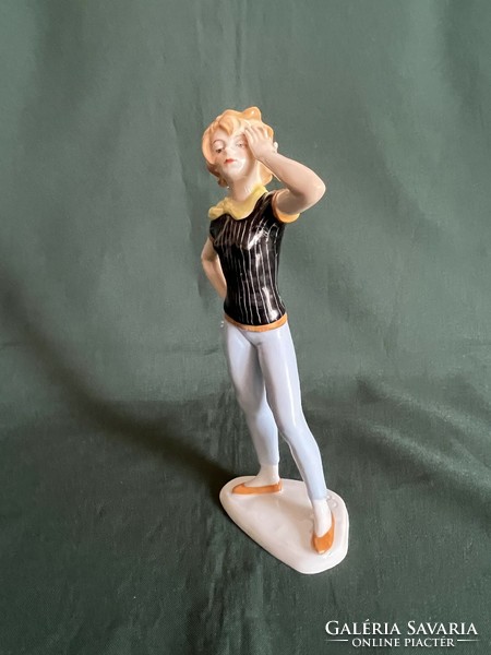 Volkstedt porcelain figurine of a girl with a scarf in a black striped shirt (p0011)