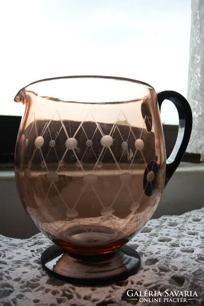 A dreamy pink thick-walled glass pitcher with polished lugs from the early 1900s, a flawless piece