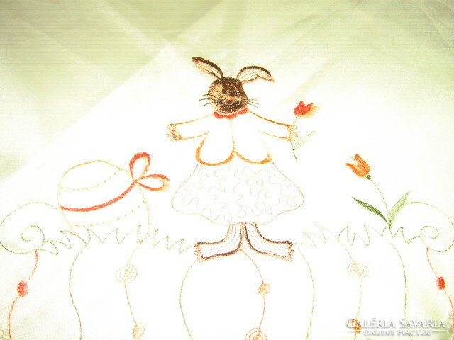 A charming Easter machine-embroidered yellow tablecloth