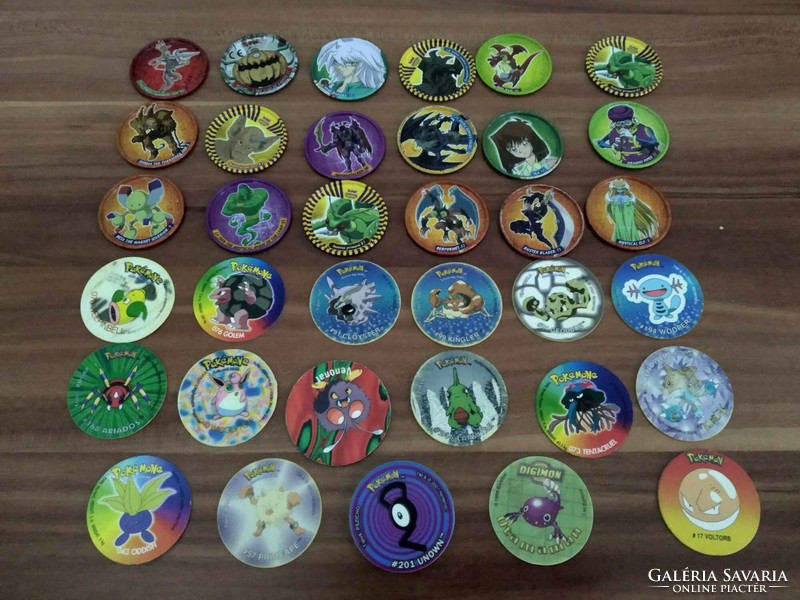 18 megaman tazos, made of metal (yu gi oh) and 17 pokemon tazos, in one