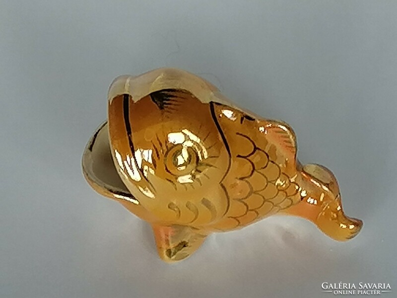 Ceramic craftsman's iridescent fish