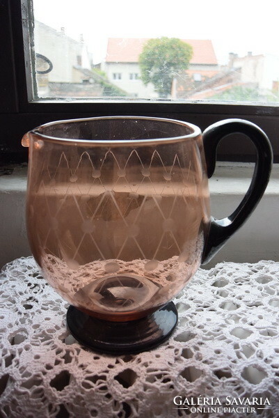 A dreamy pink thick-walled glass pitcher with polished lugs from the early 1900s, a flawless piece