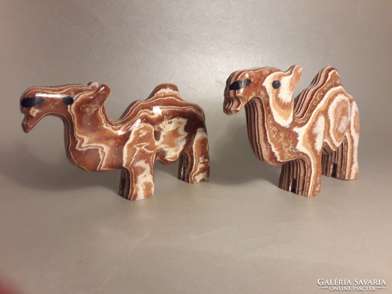 Three pieces of onyx mineral stone camel dromedary are available at a price of one piece