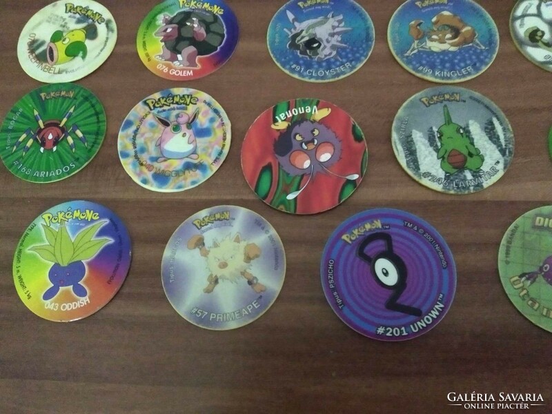 18 db Megaman Tazo, fémből (Yu Gi Oh) és 17 db Pokemon Tazo, egyben