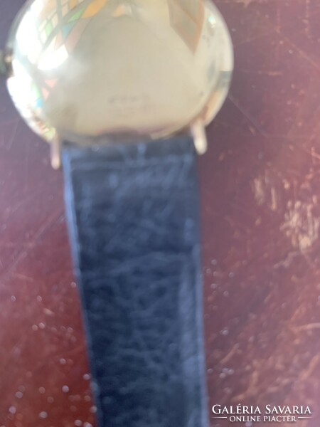 Doxa 14k gold watch.
