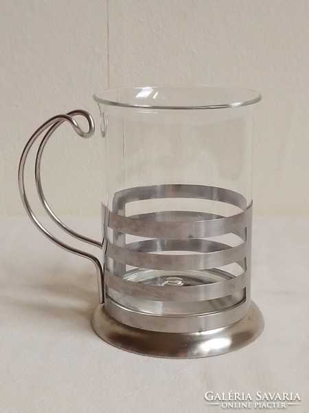 Heat-resistant glass tea coffee mulled wine glass in a stainless steel handle holder