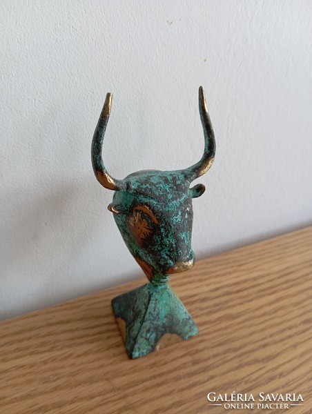 Copper bull statue. Goldsmith's work, metal work.