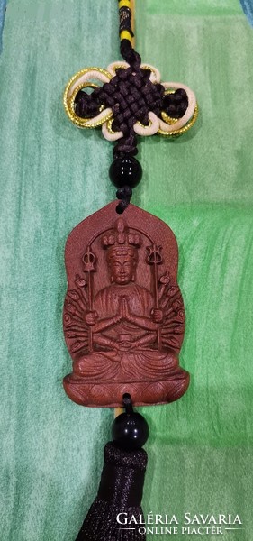 Real room. Rosewood pendant, amulet, avalokitesvara