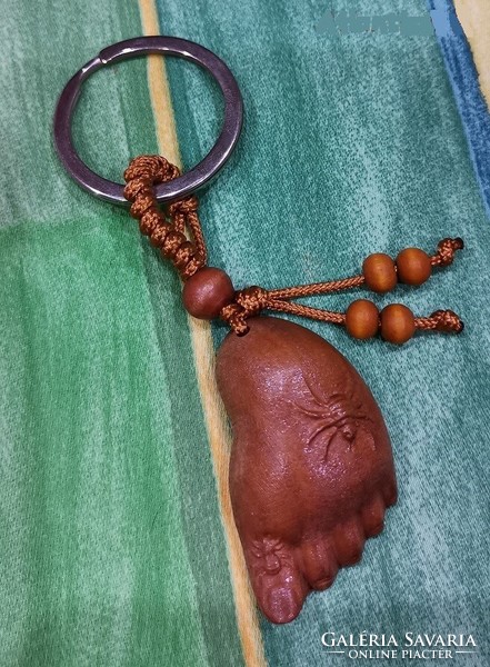 Real room. Rosewood key ring, Buddha's feet