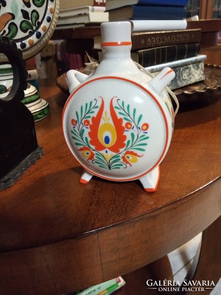 Drasche porcelain water bottle with folk art pattern, diameter 9 cm. I keep it in a display case.