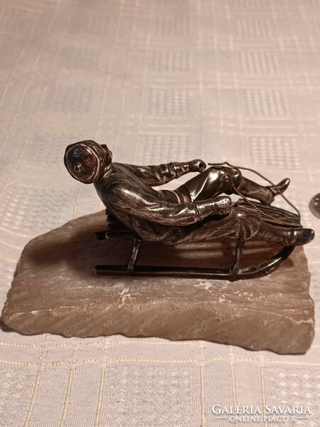 Sledding silver-plated pewter statue