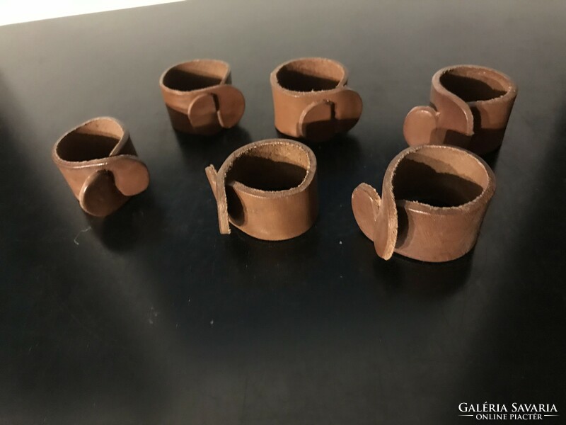 6 leather napkin rings (20/c)