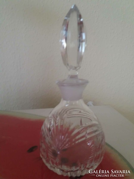 Crystal perfume bottle with polished stopper