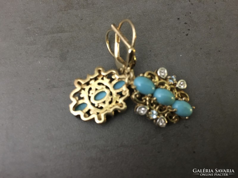 Beautiful, unique silver earrings with turquoise and topaz stones, run with gold