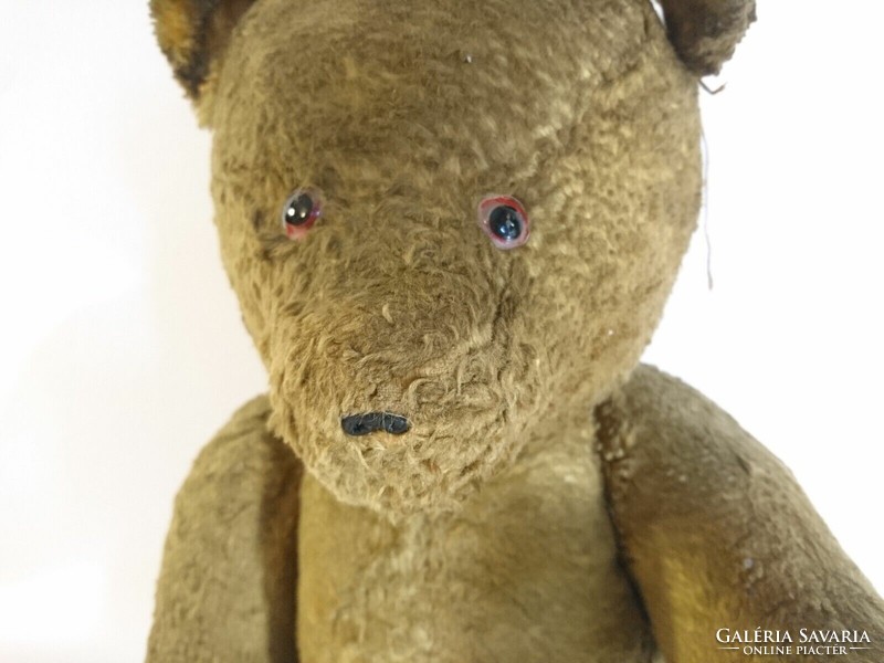 Old vintage straw stuffed teddy bear, teddy bear, glass eyes, circa 1950s Poland?