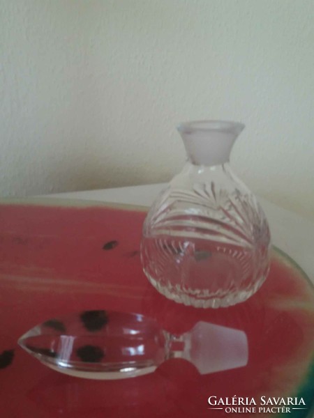 Crystal perfume bottle with polished stopper