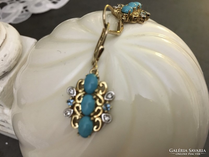 Beautiful, unique silver earrings with turquoise and topaz stones, run with gold