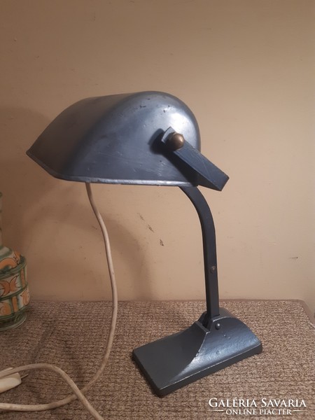 Old lamp with cast iron base