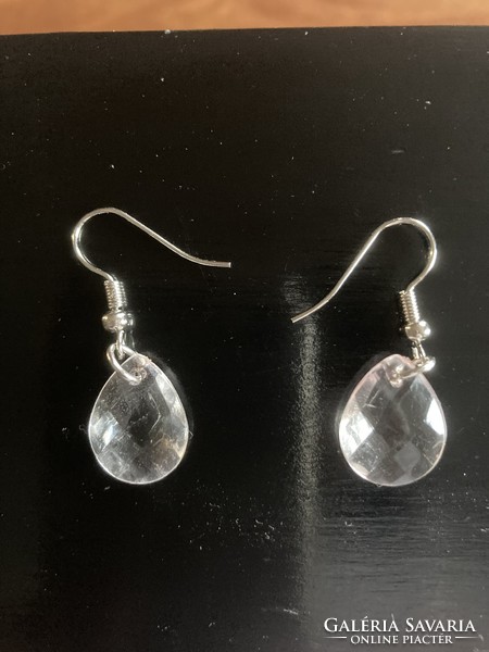 White plastic earrings with a glass effect