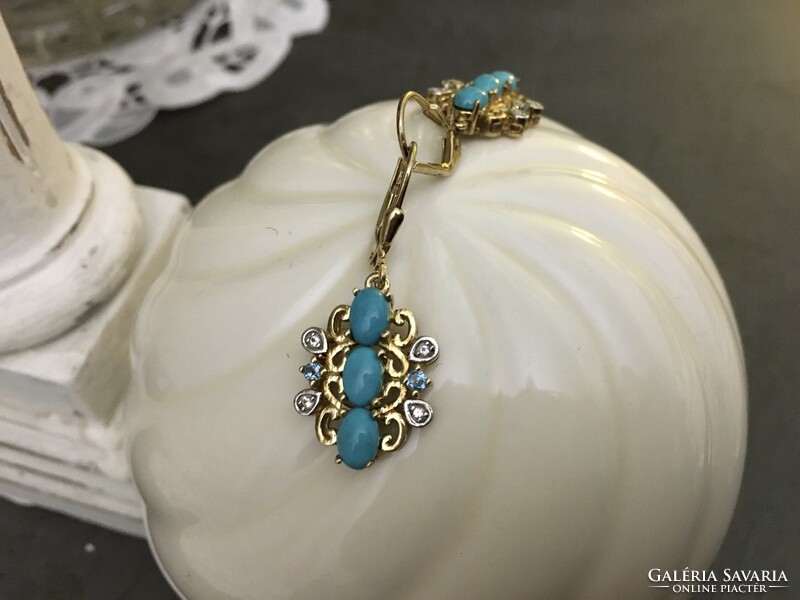 Beautiful, unique silver earrings with turquoise and topaz stones, run with gold