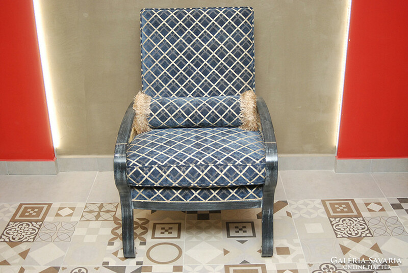 Armchair with blue upholstery in art deco style