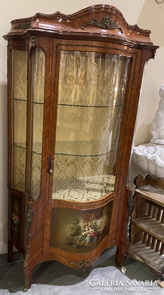 Showcase with copper decoration