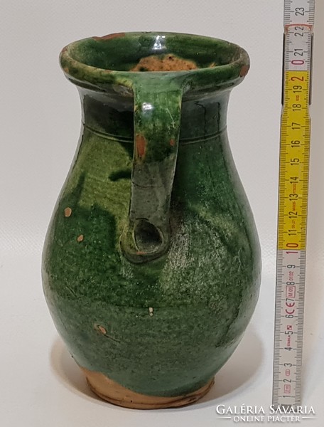 Folk ceramic milk jug with light green glaze spots and dark green glaze (2978)