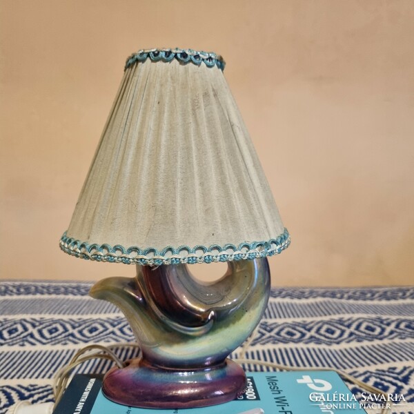 Art deco bedside lamp with a porcelain body