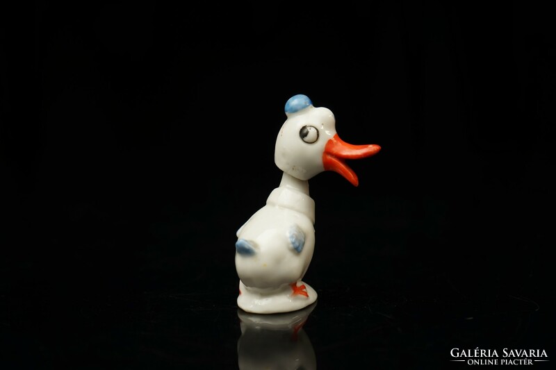 Old hand-painted porcelain duck figure / wobbling head / retro