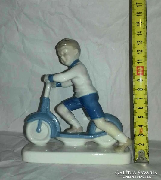 Roller skating boy - rarer German porcelain figure