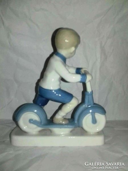 Roller skating boy - rarer German porcelain figure