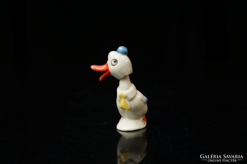 Old hand-painted porcelain duck figure / wobbling head / retro