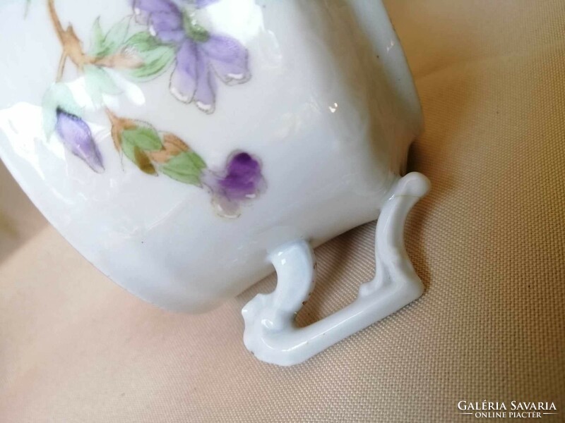 Antique tea cup with purple poppy flower decor