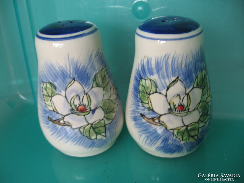 A pair of wild rose salt, pepper shakers and table spice holders