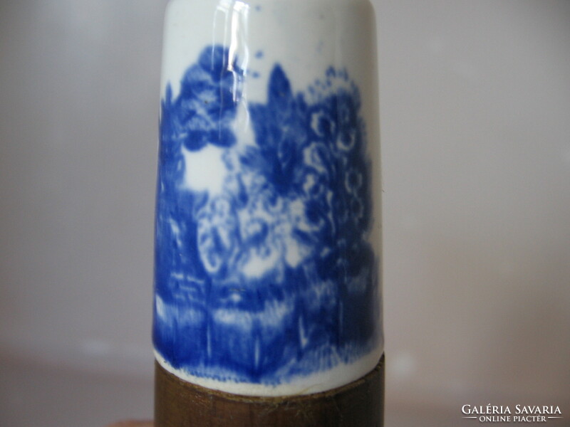 Blue willow pepper shaker, porcelain and wood