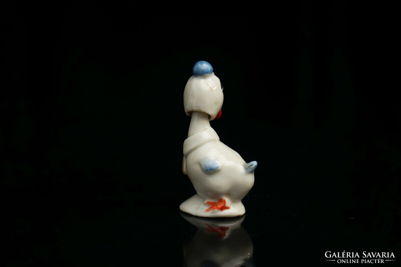 Old hand-painted porcelain duck figure / wobbling head / retro