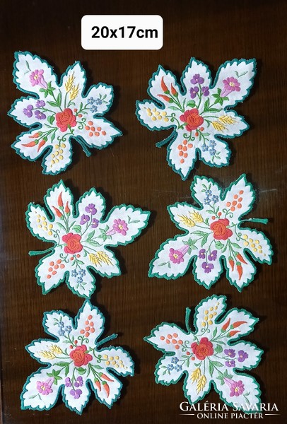 Hand-embroidered, leaf-shaped placemats