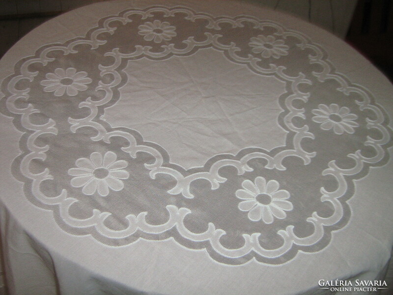 Embroidered filigree tablecloth sewn in beautiful white material