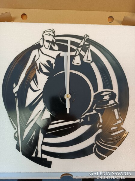 Wall clock, made of special, original vinyl record. Law.