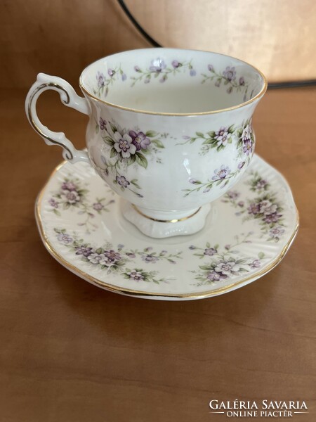 A dreamy English Elizabethan teacup with small saucer.